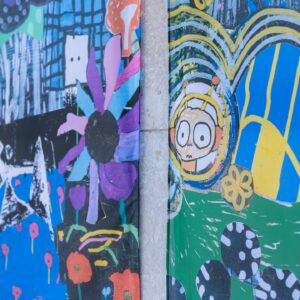 A detail from a brightly coloured artwork